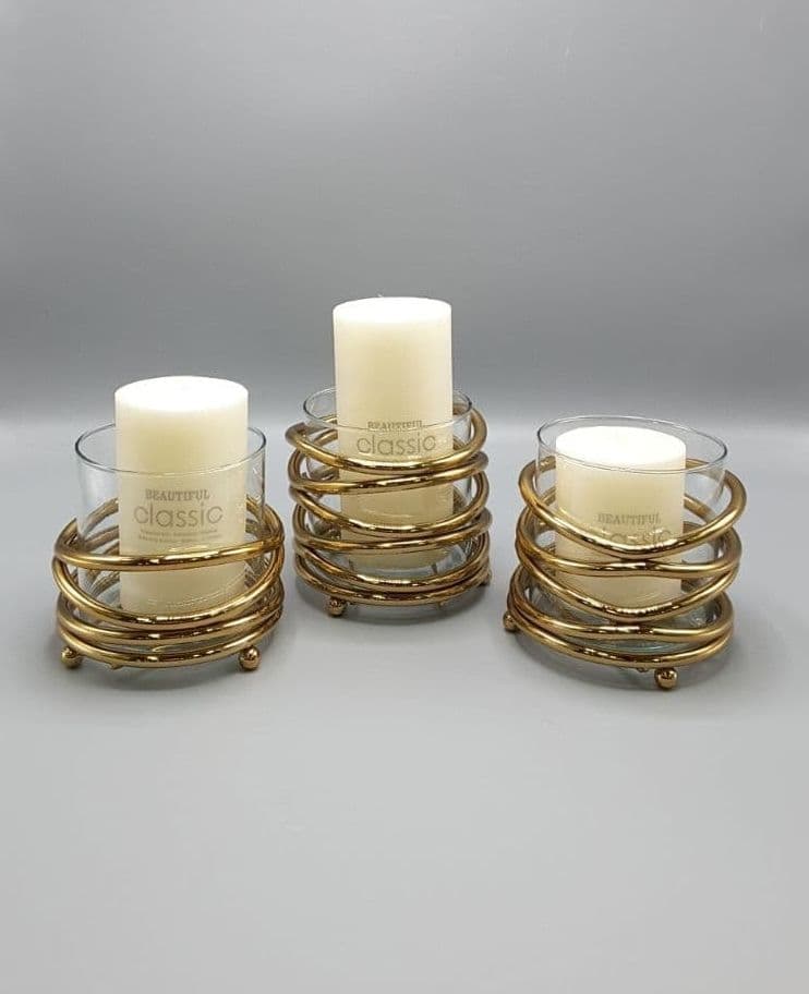 شمعدان سه سایزمدل فنری طلایی کد 100043